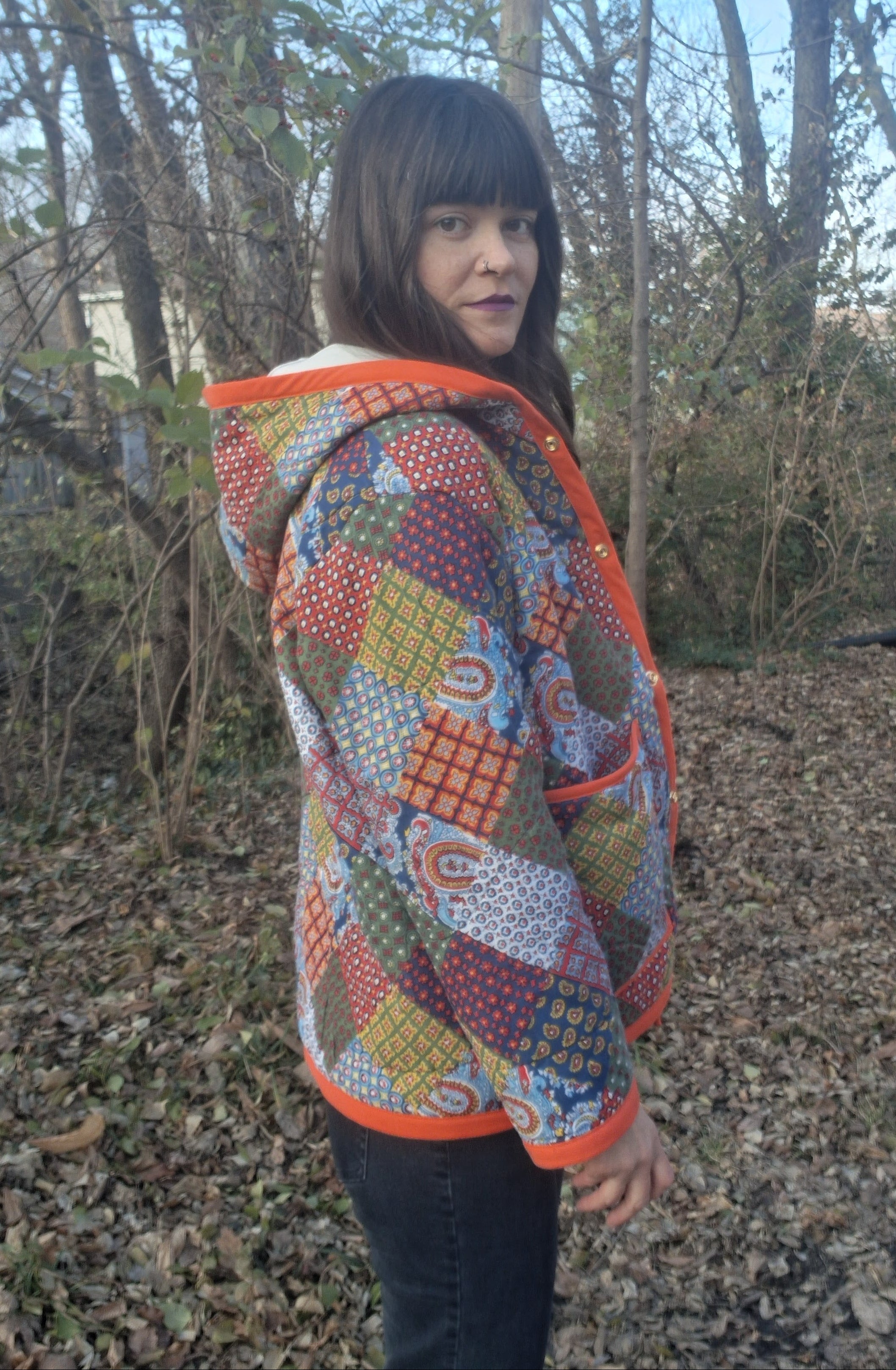 Orange, horseshoe print quilt coat