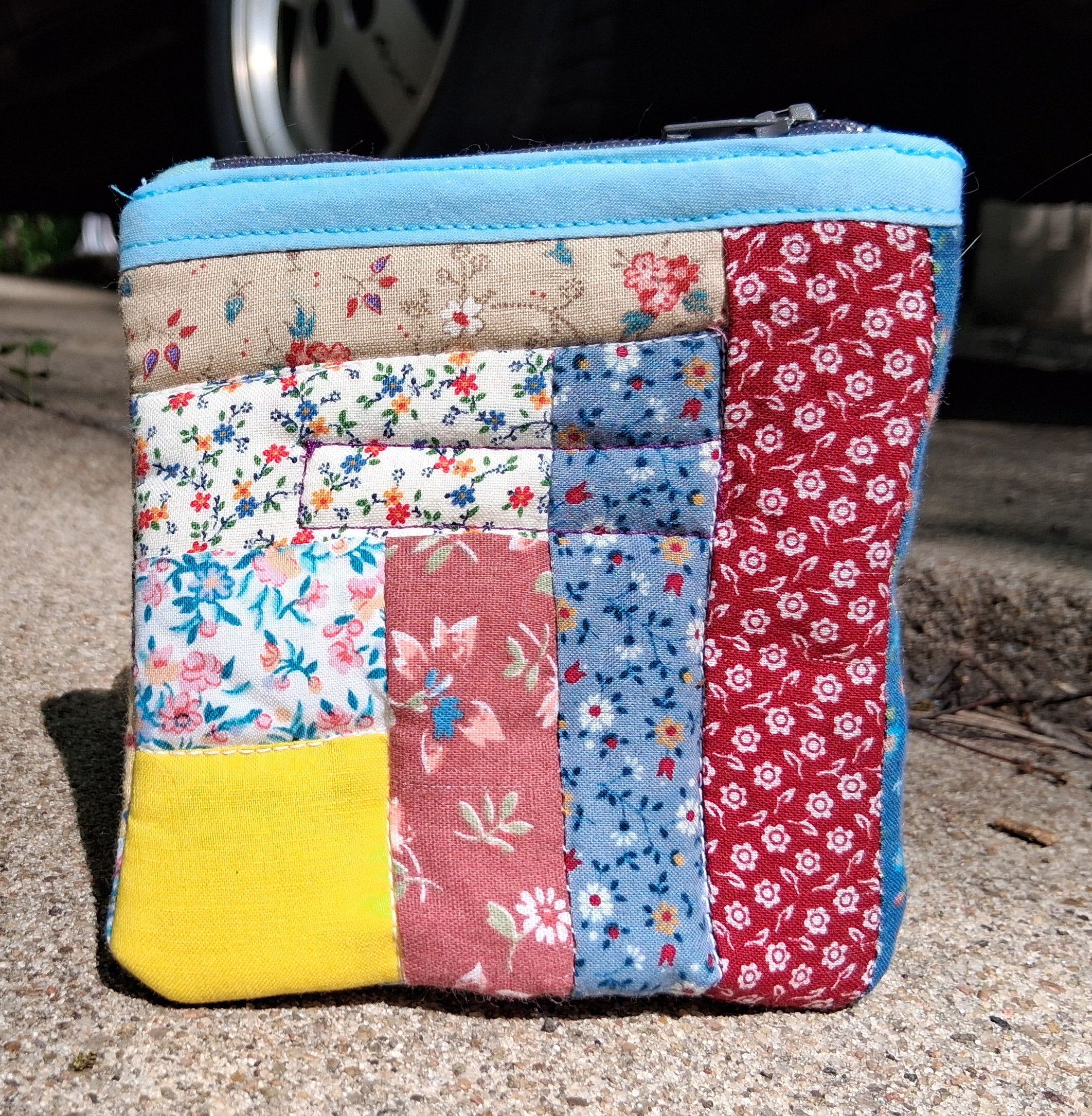 Log cabin quilted pouch