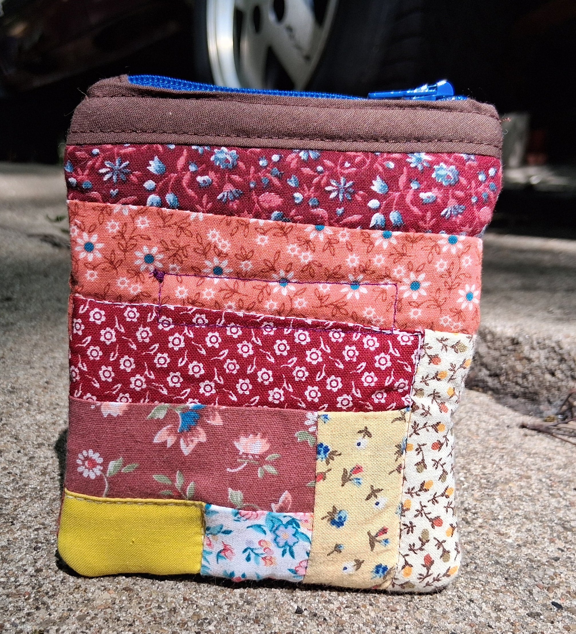 Log cabin quilted pouch