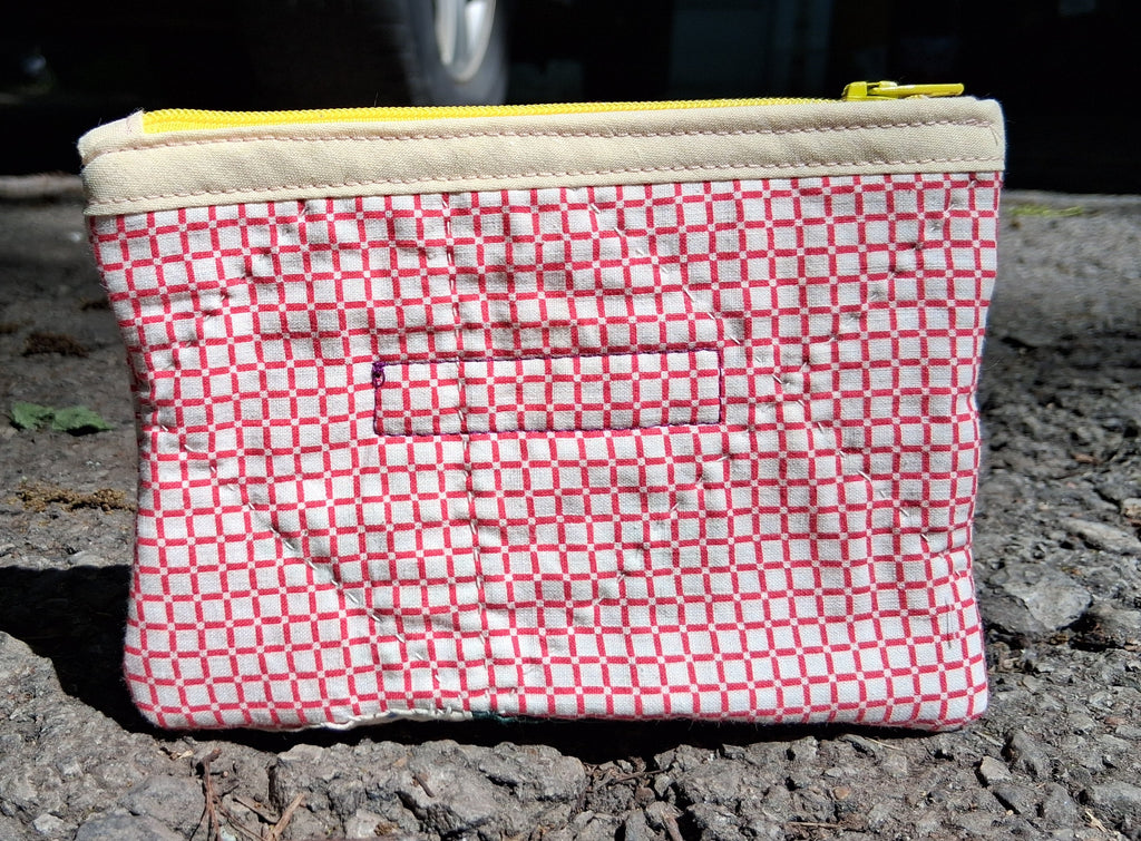 Pink quilted zipper pouch