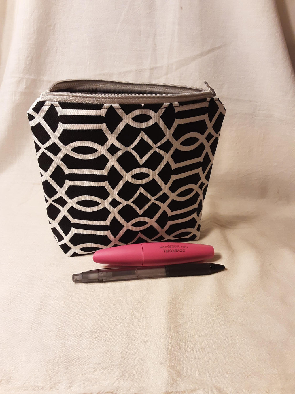 Black and white flat bottom makeup pouch
