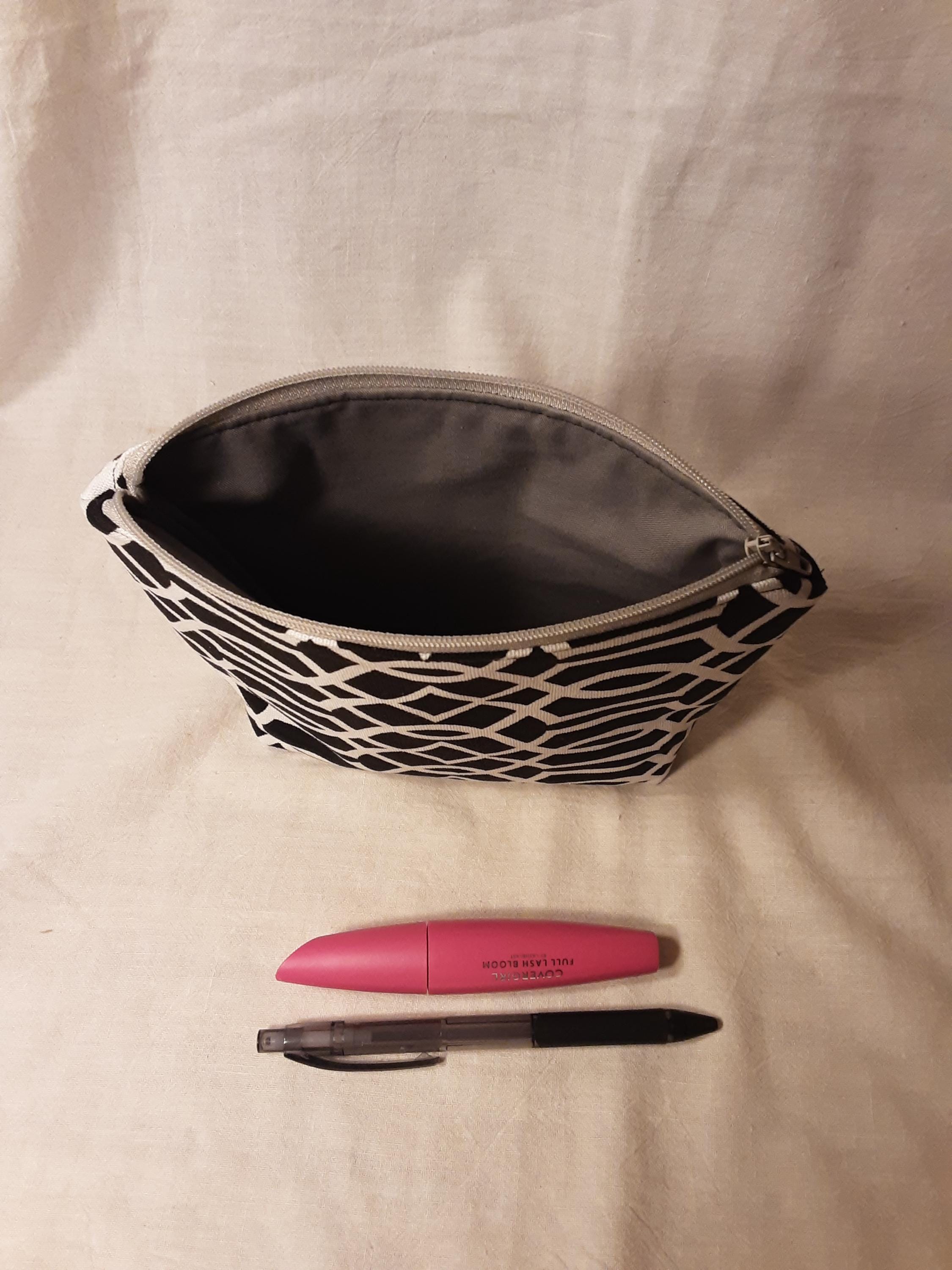 Black and white flat bottom makeup pouch