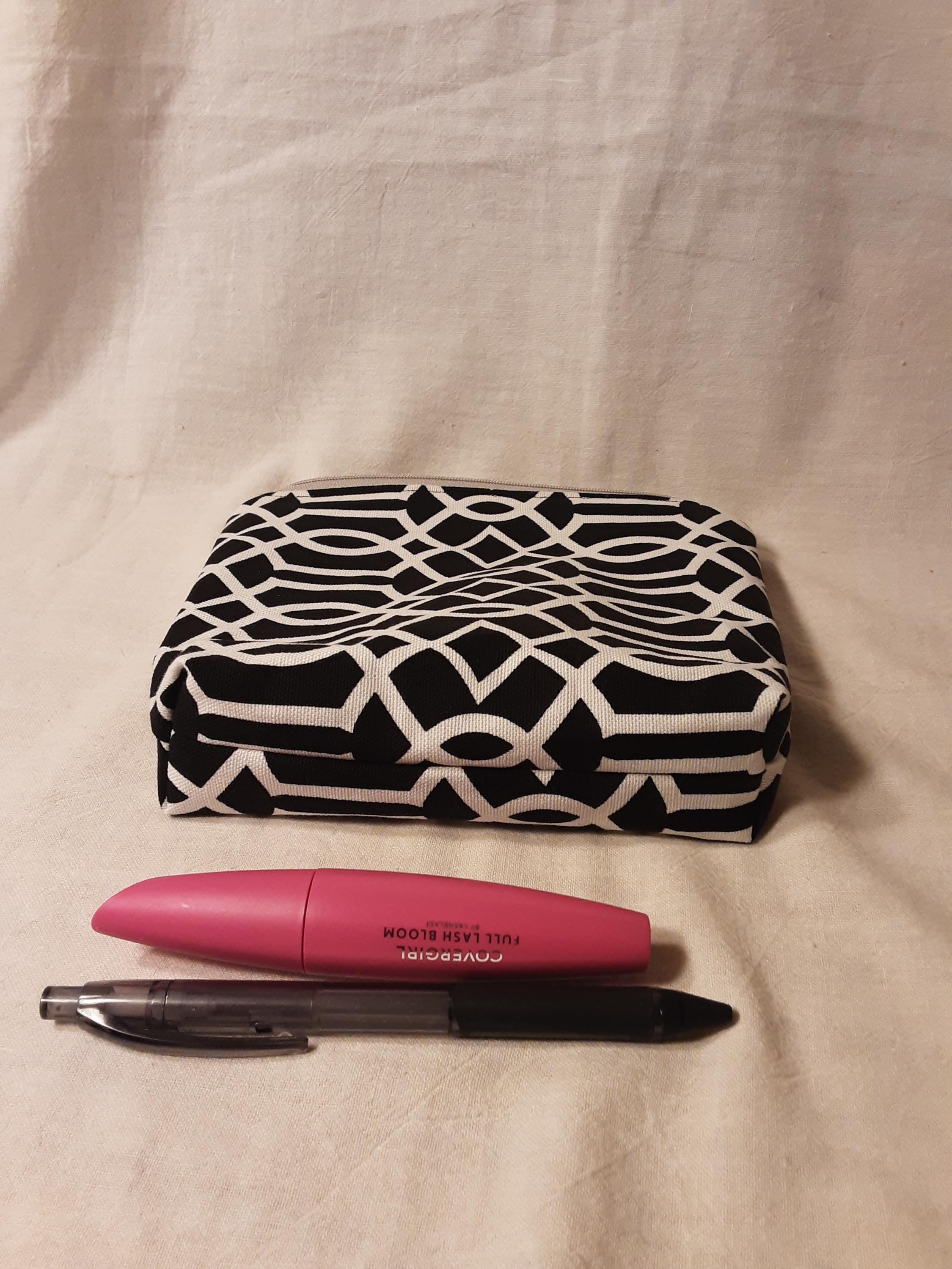 Black and white flat bottom makeup pouch