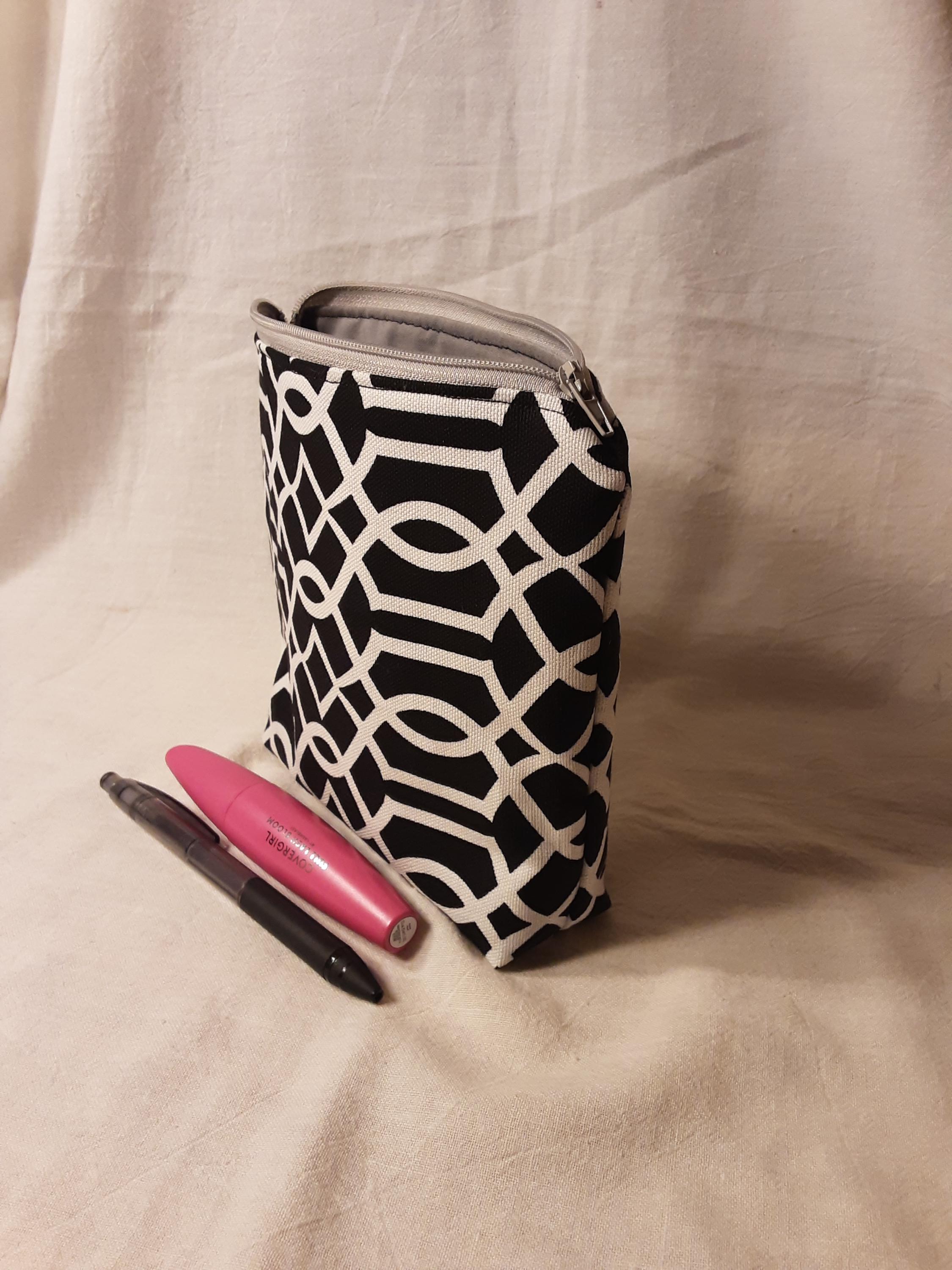 Black and white flat bottom makeup pouch